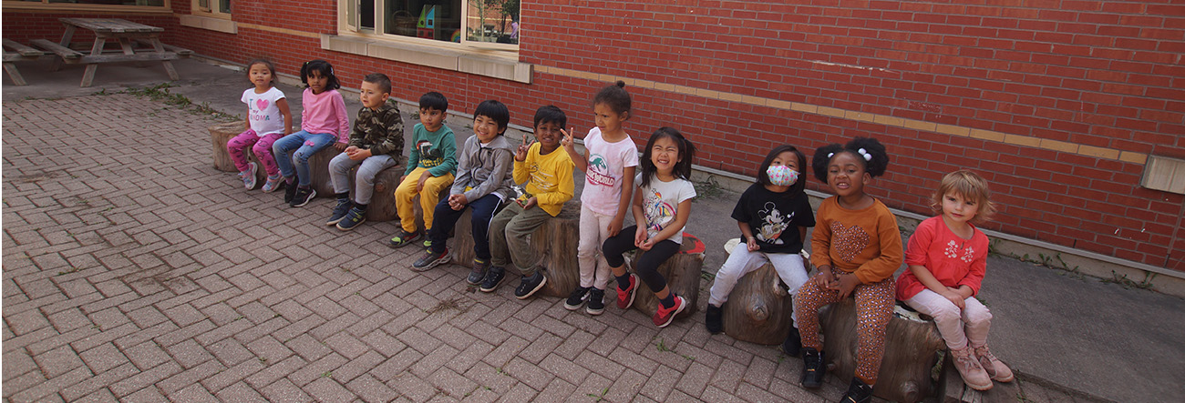 A group of Kindergarten students outside