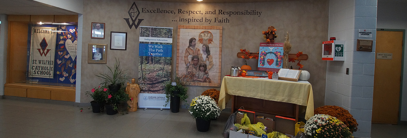 front lobby of school, alter, banners on catholic graduate expectations and Indigenous Education